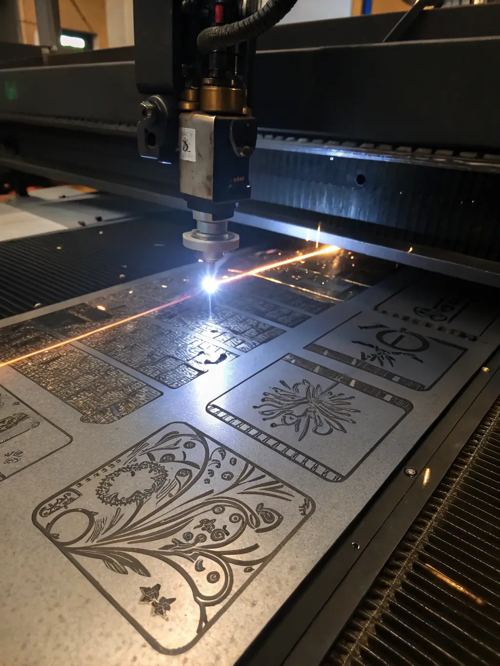 A macro shot of the LASEX laser engraving a custom logo onto a brushed metal panel, with crisp lines and fine detail highlighted under bright workshop lighting.